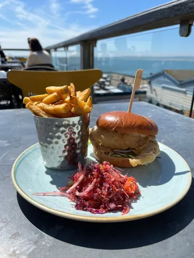 Burger , chips and a clear sea view